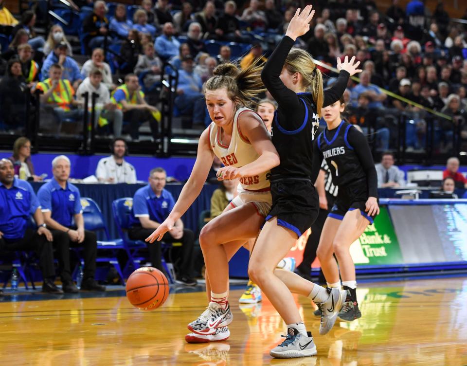 Wagner's Emma Yost drives to the basket in a semifinal basketball game against St. Thomas More for the state Class A tournament on Friday, March 11, 2022, at Frost Arena in Brookings.