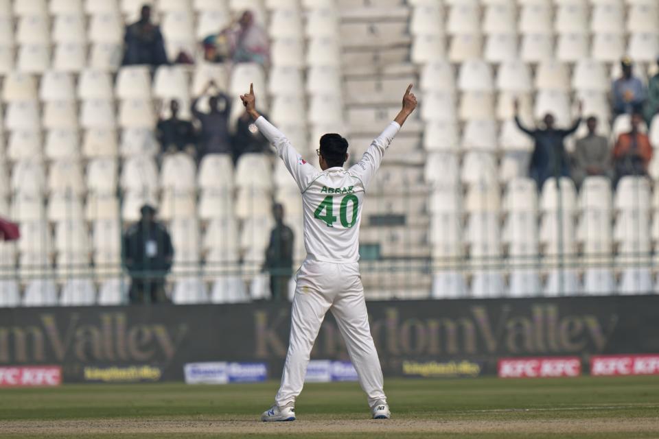 Pakistan's Abrar Ahmed celebrates after the dismissal of England's Ollie Pope during the first day of the second test cricket match between Pakistan and England, in Multan, Pakistan, Friday, Dec. 9, 2022. (AP Photo/Anjum Naveed)