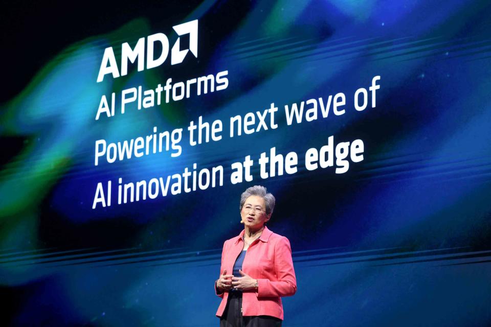 <p>I-Hwa CHENG / AFP / Getty Images</p> AMD CEO Lisa Su delivering a keynote speech at Computex 2024, in Taipei, Taiwan, on June 3, 2024.