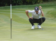Joaquin Niemann lines up a putt on the 13th green during the final round of the LIV Golf Invitational-Boston tournament, Sunday, Sept. 4, 2022, in Bolton, Mass. (AP Photo/Mary Schwalm)