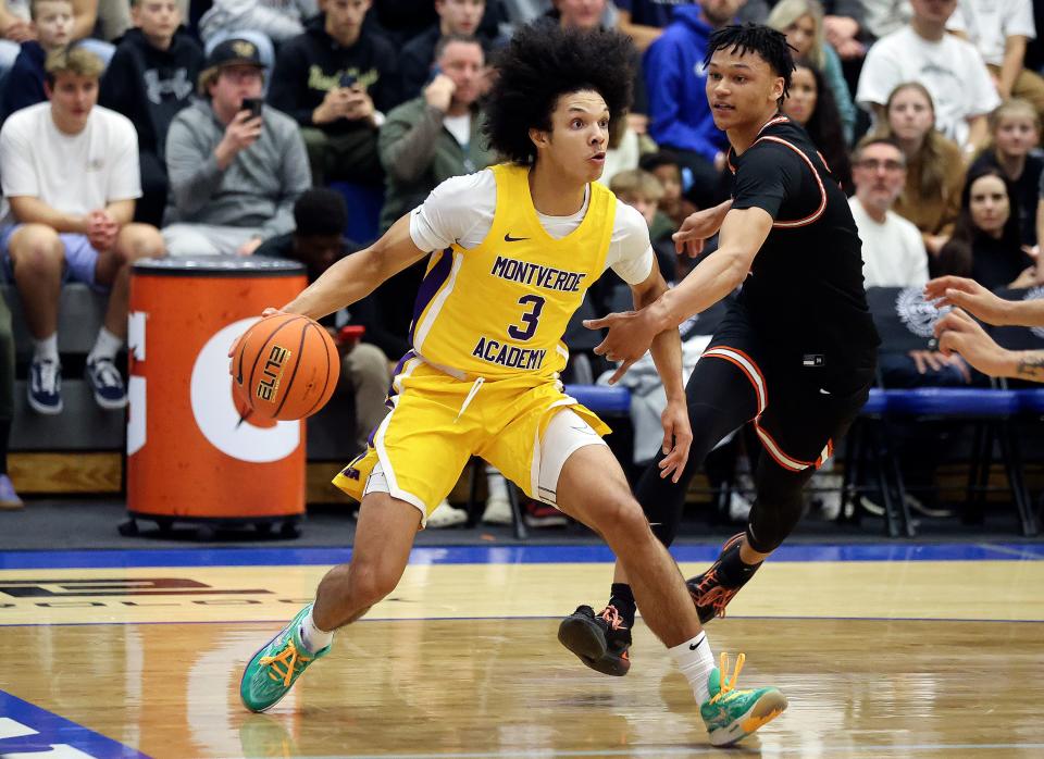 Montverde Academy’s Curtis Givens moves around Wasatch Academy’s Isiah Harwell during a National Hoopfest Utah Tournament game at Pleasant Grove High School in Pleasant Grove on Monday, Nov. 20, 2023. Montverde won 88-53. | Kristin Murphy, Deseret News