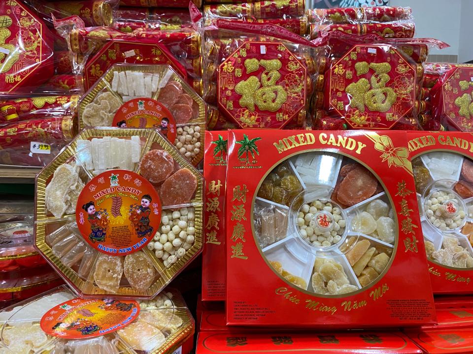 "Togetherness trays" containing various candied fruits and seeds, all commonly eaten for Tet are available for purchase at Super Cao Nguyen grocery store in Oklahoma City.