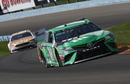 Aug 5, 2018; Watkins Glen, NY, USA; Monster Energy NASCAR Cup Series driver Kyle Busch (18) during the Go Bowling at The Glen at Watkins Glen International. Mandatory Credit: Timothy T. Ludwig-USA TODAY Sports