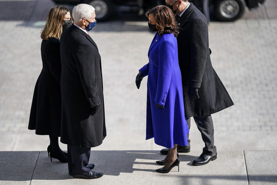 Former Vice President Mike Pence and his wife, Karen Pence speak with Vice President Kamala Harris and Doug Emhoff, after the inauguration.<span class="copyright">Melina Mara—Pool/The Washington Post/Shutterstock</span>