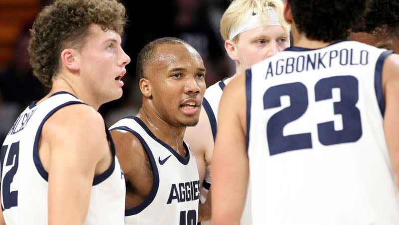 Utah State senior guard Darius Brown II (10) gathers the team together during the Aggies’ exhibition game against Montana State Billings on Nov. 3 at the Spectrum in Logan.