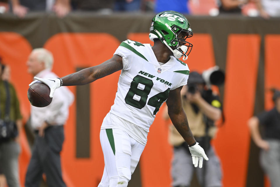 New York Jets wide receiver Corey Davis (84) celebrates after he made a catch and took it in for a touchdown against the Cleveland Browns during the second half of an NFL football game, Sunday, Sept. 18, 2022, in Cleveland. (AP Photo/David Richard)