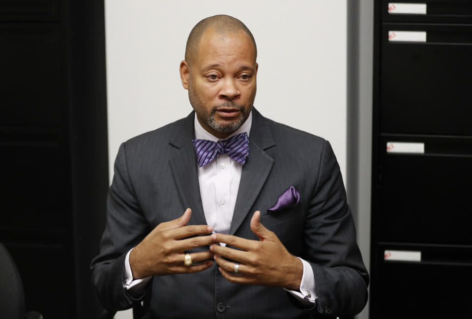 Nevada's incoming Attorney General Aaron Ford speaks with The Associated Press, Friday, Dec. 14, 2018, in Las Vegas. Ford wants to find a way to implement a stalled, voter-approved gun background check law when he takes office early next year after his predecessor, Republican Adam Laxalt, said the measure couldn’t be enforced. (AP Photo/John Locher)