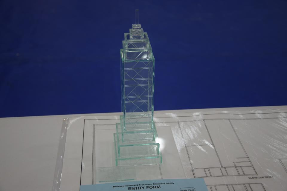 Petoskey student Reagan Walsh’s 3D model project. She said usually students do the project in wood, but she wanted her model to be a skyscraper, so hers was laser cut out of acrylic and included a floor plan.