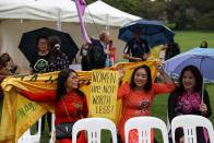 People participate in a rally for International Women's Day in Sydney
