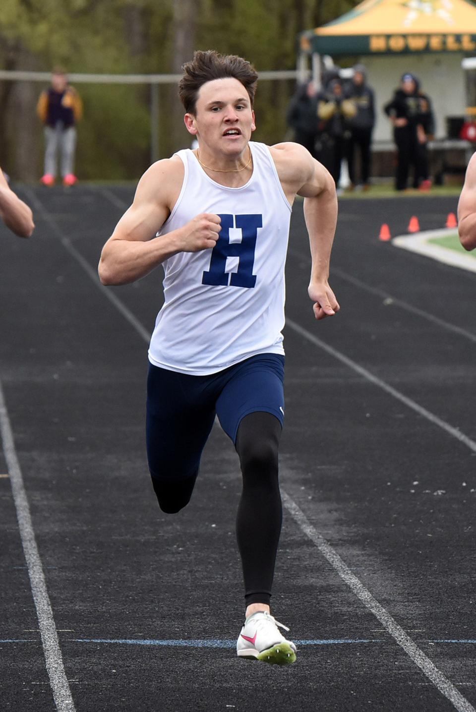 Hartland's Cameron Cheetam won the 100-meter dash and 200 during the Highlander Games track and field meet Saturday, April 20, 2024 at Howell High School.