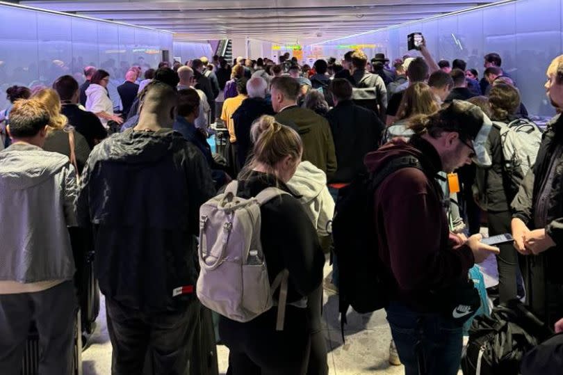 Holidaymakers face chaos at Heathrow Airport as emergency services evacuate terminal 2