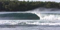 <strong>Papua New Guinea </strong> With a thorough surf management plan (SMP) that keeps surfers in the water capped at 12 people per break/surf camp, PNG is surfing’s new frontier. Surfers pay a nominal fee to surf and base at one of the country’s handful of surf camps, with profits going back to the local villages and community projects. The waves are epic: uncrowded, consistent, and with plentiful variety. Tupira Surf Club in Madang is our favourite, and boasts a reeling right-hand just metres from the door of your hut.