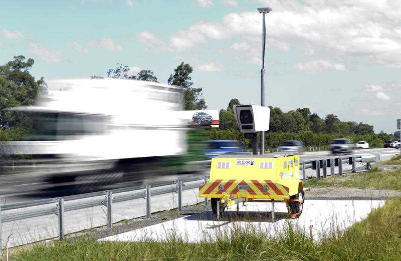 A mobile speed camera is seen on the M1 Motorway south of Brisbane.
