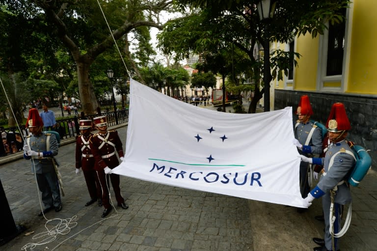 The Mercosur flag is raised in front of the Venezuelan Foreign Office building, in Caracas on August 5, 2016