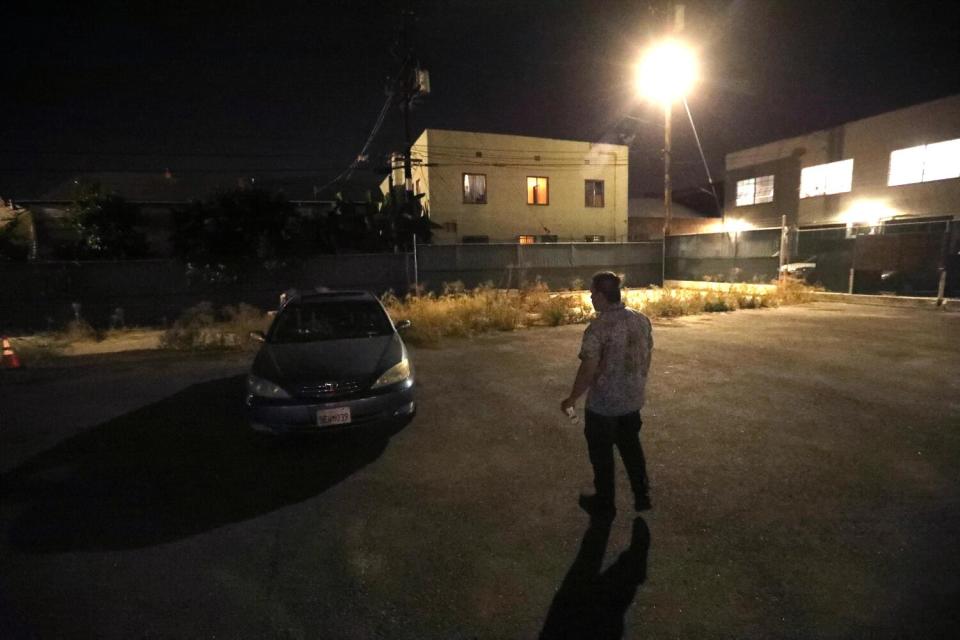 Saul, 55, walks to his car in a Safe Parking lot where he spends the night while living homeless in Hollywood.