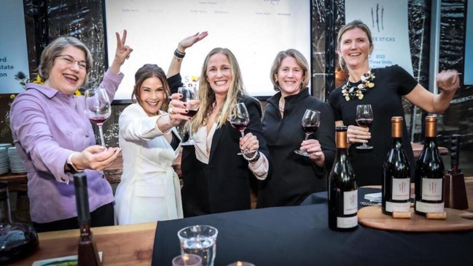 From left, Bettina Sichel of Laurel Glen Vineyard, actress Teri Hatcher, Prema Kerollis Behan of Three Sticks Wines and Whitney Fisher and Cameron Fisher of Fisher Vineyards kick off the Barrel Auction at the Epic Party at Mayacama at the 2023 V Foundation Sonoma Epicurean weekend in Sonoma County. (V Foundation Sonoma Epicurean)