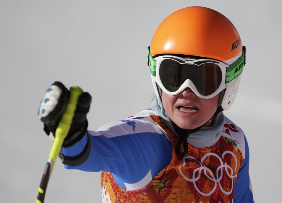 Italy's Verena Stuffer gestures in the finish area after completing a women's downhill training run at the Sochi 2014 Winter Olympics, Thursday, Feb. 6, 2014, in Krasnaya Polyana, Russia. AP Photo/Gero Breloer)