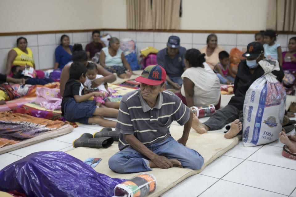 Residents of the Monkey Point community rest at a temporary shelter in Bluefields, Nicaragua, Saturday, July 2, 2022, after Tropical Storm Bonnie hit the Caribbean coast of Nicaragua. (AP Photo/Inti Ocon)