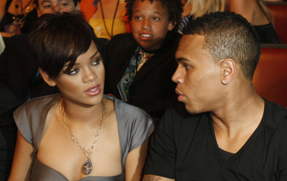 Rihanna and Chris Brown in the audience at the 2008 MTV Movie Awards on June 1, 2008 at the Gibson Amphitheatre in Universal City, California.