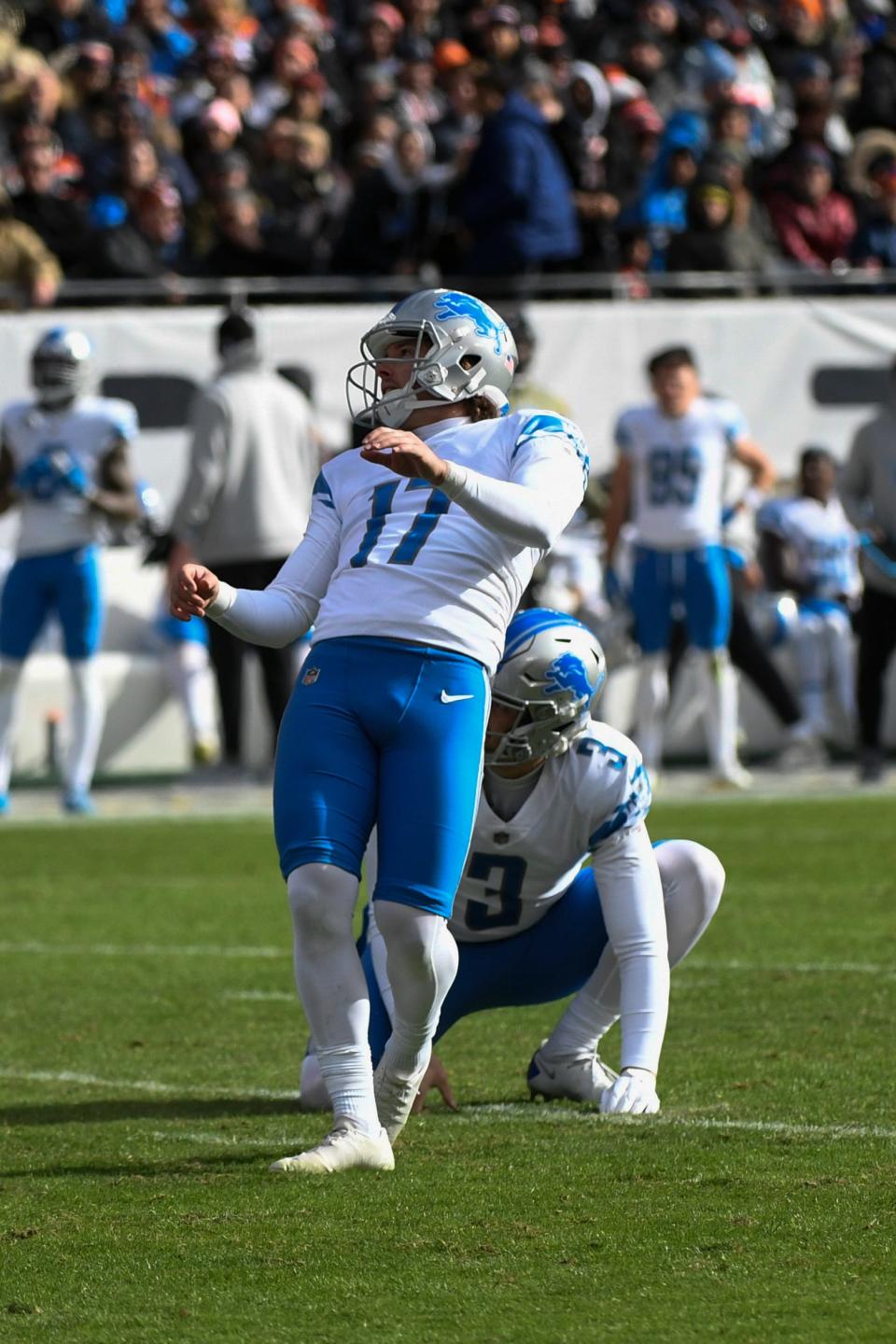 Nov 13, 2022; Chicago, Illinois, USA;  Detroit Lions place kicker Michael Badgley (17) watches his field goal against the Chicago Bears during the first half at Soldier Field. Mandatory Credit: Matt Marton-USA TODAY Sports