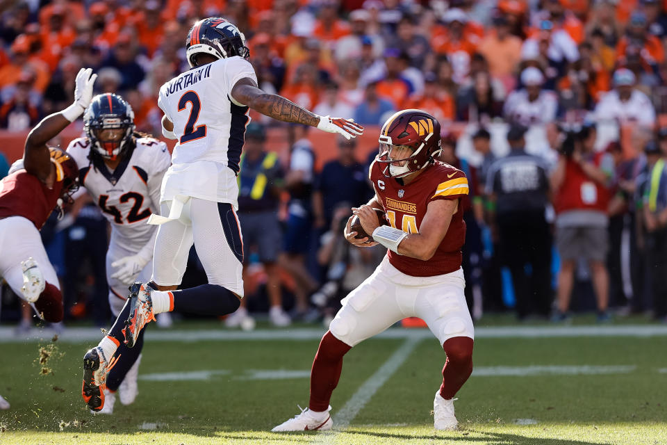 Denver Broncos cornerback Pat Surtain II (2) pressures Washington Commanders quarterback Sam Howell (14). Mandatory Credit: Isaiah J. Downing-USA TODAY Sports