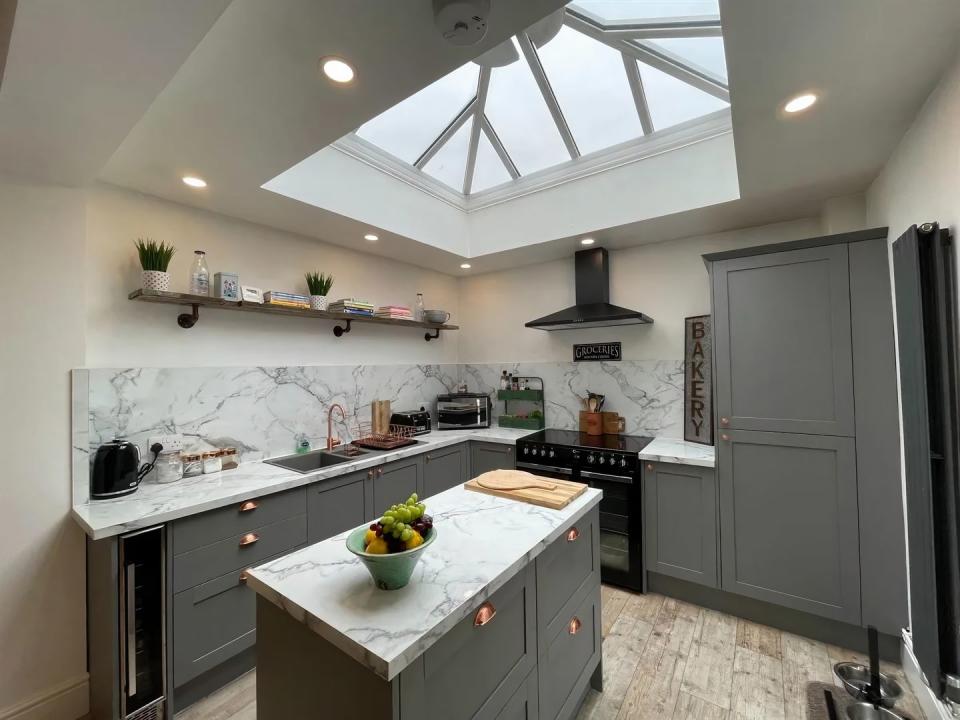 <p>Kitchen goals! We're big fans of the marble worktops, skylight and grey cabinets. </p>