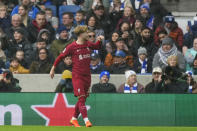 Liverpool's Harvey Elliott celebrates after scoring his side's opening goal during the FA Cup 4th round soccer match between Brighton and Hove Albion and Liverpool at the Falmer Stadium in Brighton, England, Sunday, Jan. 29, 2023. (AP Photo/Alastair Grant)