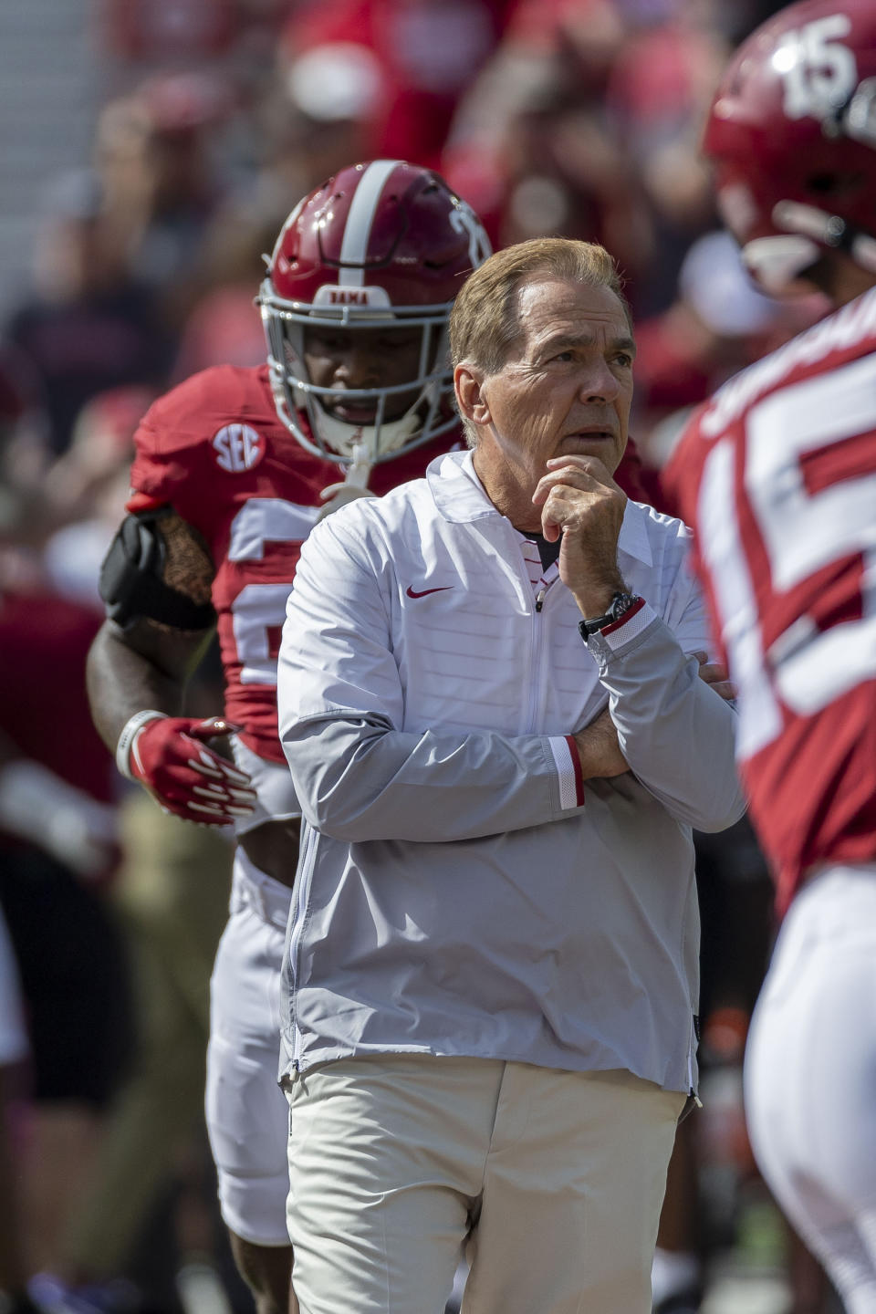 Alabama head coach Nick Saban tracks his team's warm-up before an NCAA college football game against Tennessee, Saturday, Oct. 21, 2023, in Tuscaloosa, Ala. (AP Photo/Vasha Hunt)