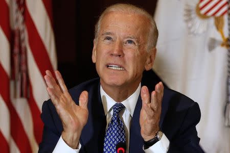 U.S. Vice President Joe Biden delivers opening remarks at the White House Build America Investment Initiative Roundtable in the Eisenhower Executive Office Building in Washington October 14, 2015. REUTERS/Jonathan Ernst