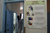 <p>A Yemeni doctor inspects children suspected of being infected with cholera at a hospital in Sana’a, Yemen on June 15, 2017. (Yahya Arhab/EPA/REX/Shutterstock) </p>