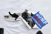 FILE - In this Jan. 6, 2021, file photo, supporters of then-President Donald Trump are seen outside the Capitol in Washington. (AP Photo/Jose Luis Magana, File)