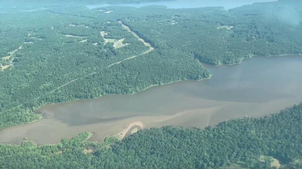 Sediment from Lick Creek is making its way downstream into a branch Falls Lake, as shown in this photo from an aerial flight taken in June. Sound Rivers is suing Clayton Properties Group, alleging sediment from its Sweetbrier development is impacting Martin Branch and then Lick Creek before reaching Falls Lake.