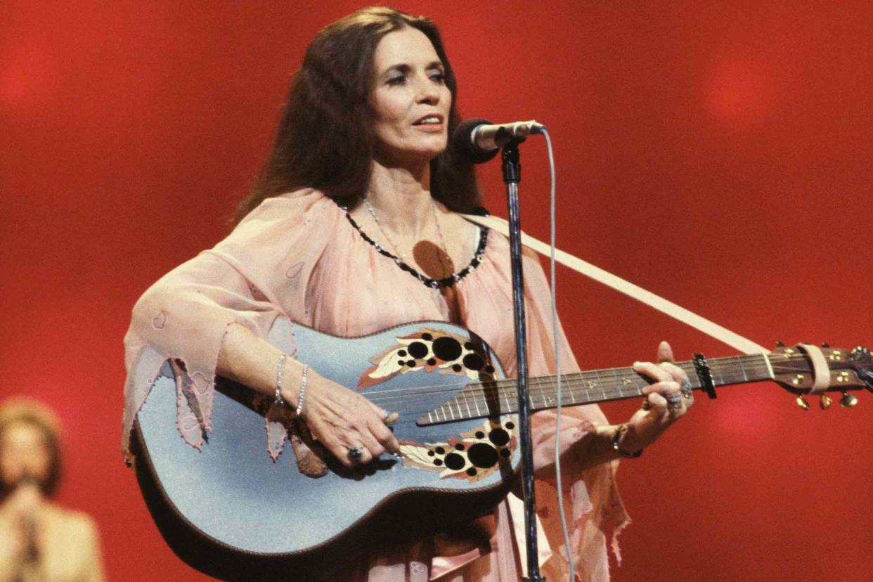 <p>CBS via Getty</p> June Carter Cash performing in 1979