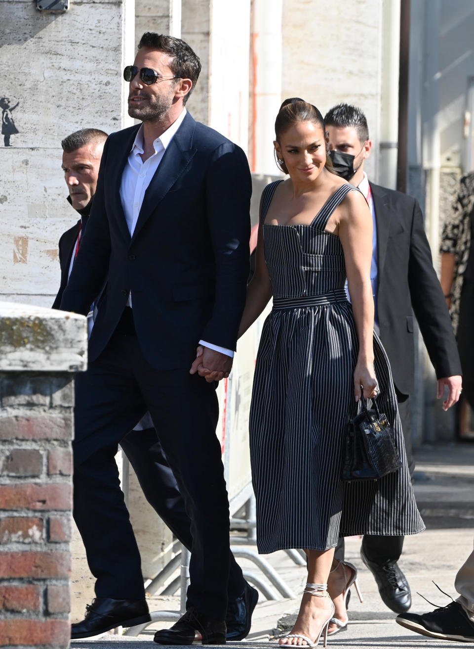 Ben Affleck and Jennifer Lopez leave at the 78th Venice International Film Festival on September 10, 2021 in Venice, Italy. (Getty Images)