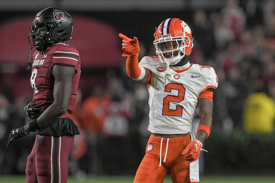 Nov 25, 2023; Columbia, South Carolina, USA; Clemson Tigers cornerback Nate Wiggins (2) smiles after breaking up a pass to South Carolina wide receiver Nyck Harbor (8) during the fourth quarter at Williams-Brice Stadium. Clemson won 16-7. Mandatory Credit: Ken Ruinard-USA TODAY Sports