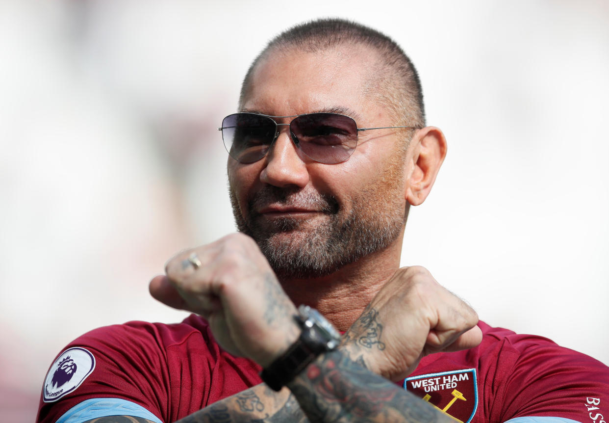 Soccer Football - Premier League - West Ham United v Wolverhampton Wanderers - London Stadium, London, Britain - September 1, 2018  Dave Bautista gestures before the match    REUTERS/David Klein  EDITORIAL USE ONLY. No use with unauthorized audio, video, data, fixture lists, club/league logos or "live" services. Online in-match use limited to 75 images, no video emulation. No use in betting, games or single club/league/player publications.  Please contact your account representative for further details.