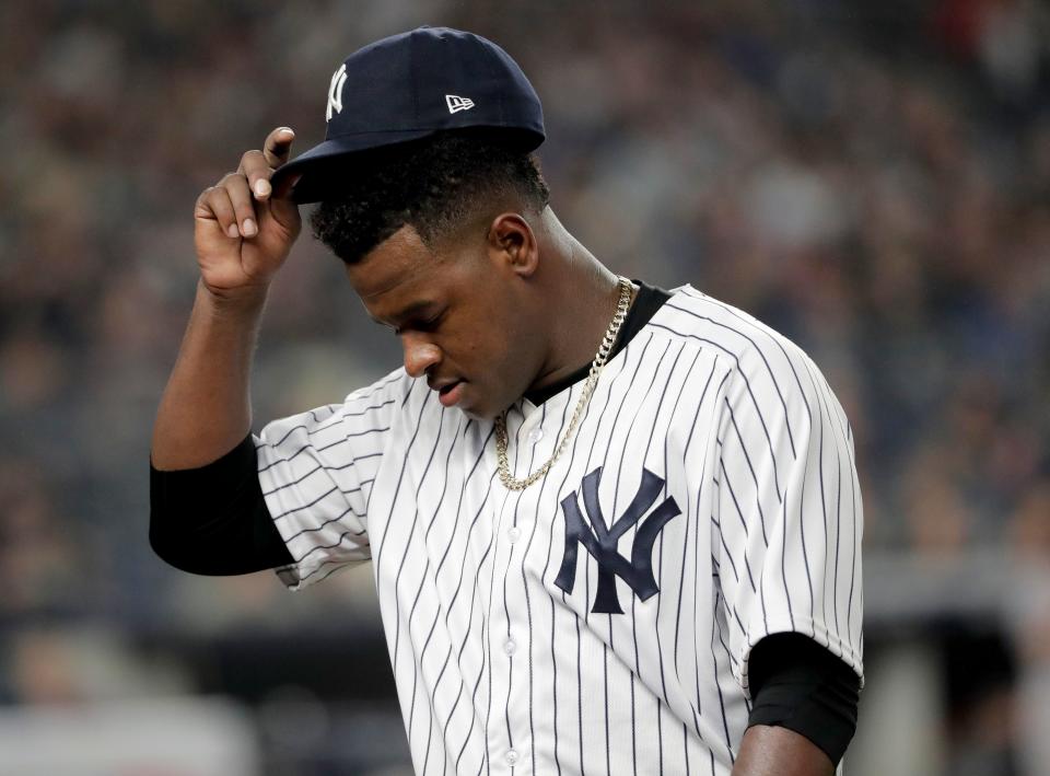 New York Yankees starting pitcher Luis Severino walks off the field during the fourth inning of Game 3 of baseball's American League Division Series against the Boston Red Sox, Monday, Oct. 8, 2018, in New York. (AP Photo/Frank Franklin II)