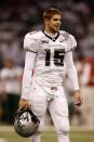 <p>Brennan’s No. 15 was retired by Hawaii after he threw the most career TD passes of any QB in his time with the school. Brennan threw for over 14,000 yards and 131 touchdowns in three seasons at Hawaii and was a Heisman finalist in 2007.</p> 