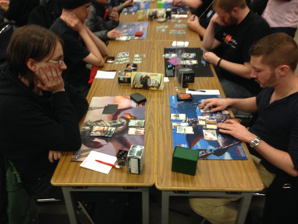 Players competing in a Magic: The Gathering tournament