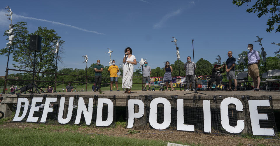 FILE - In this June 7, 2020, file photo, Alondra Cano, a City Council member, speaks during "The Path Forward" meeting at Powderhorn Park on Sunday, June 7, 2020, in Minneapolis. On Wednesday, Dec. 8, 2020, the Minneapolis City Council will decide whether to shrink the city's police department while violent crime is already soaring and redirect funding toward alternatives for reducing violence. (Jerry Holt/Star Tribune via AP, File)