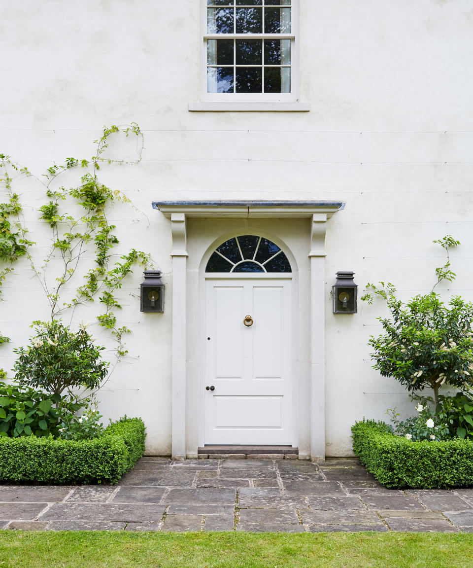 <p> If planting space is really at a premium, think vertically for some of the best small front garden ideas.  </p> <p> ‘Drape the terraces and perimeter walls with the best climbing plants, such as vines, like jasmine and honeysuckle,’ suggests Mintee Kalra, landscape designer and Peruse co-founder.  </p> <p> Vertical garden ideas, including climber plants, will cater for your floral desires by using your home's walls as a structure upon which to bloom. In this example, plants wind their way up the walls of the house to provide a charming frame to the entrance. </p>
