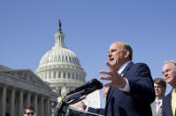 Rep. Louie Gohmert of Texas, joined by fellow House Republicans, gestures during a news conference