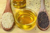 <p>Speaking of sesame oil, this flavor enhancer is hiding some powerful nutrients, too. It’s filled with heart-healthy monounsaturated and polyunsaturated <a href="https://www.prevention.com/health/health-conditions/a33526571/high-cholesterol-treatment-prevention/" rel="nofollow noopener" target="_blank" data-ylk="slk:fats;elm:context_link;itc:0;sec:content-canvas" class="link ">fats</a>, antioxidants that help fight damaging free radicals in the body, and an amino acid called tyrosine, which boosts levels of the mood-lifting hormone serotonin. </p><p>“Toasted sesame oil has a low smoke point, so it’s better to cook with a different oil and add this at the end or mixed into a sauce,” Iu recommends. “And don’t forget: A little goes a long way when it comes to flavor and aroma.”</p>