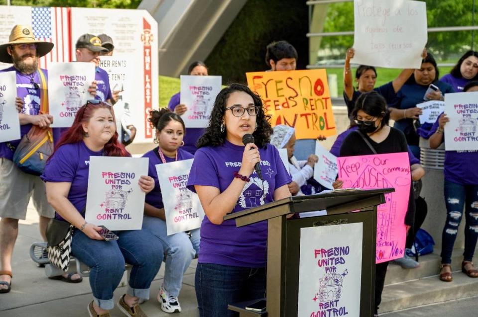 Marisa Moraza, campaign director for Power California Action, speaks during a rally among a coalition of unhoused, youth, families, and faith leaders urging council members and the mayor to address the housing crisis, including rent control and tenant protections and pass immediate, long-term housing solutions, outside Fresno City Hall on Thursday, April 27, 2023.