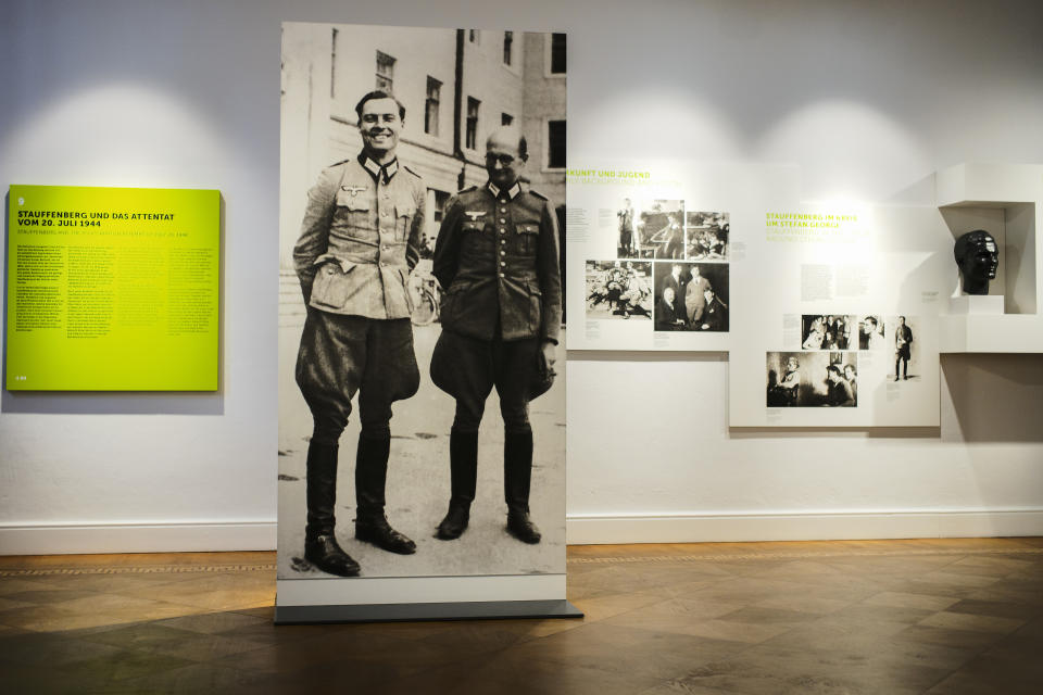 In this Friday, July 12, 2019 photo a picture of Claus Schenk Graf von Stauffenberg, left, and Albrecht Ritter Merz von Quirnheim is displayed a the exhibition at the German Resistance Memorial Center inside the Bendlerblock building of the defensive ministry in Berlin. Stauffenberg was one of the leaders of the failed assassinate to Adolf Hitler one July 20, 1944. (AP Photo/Markus Schreiber)