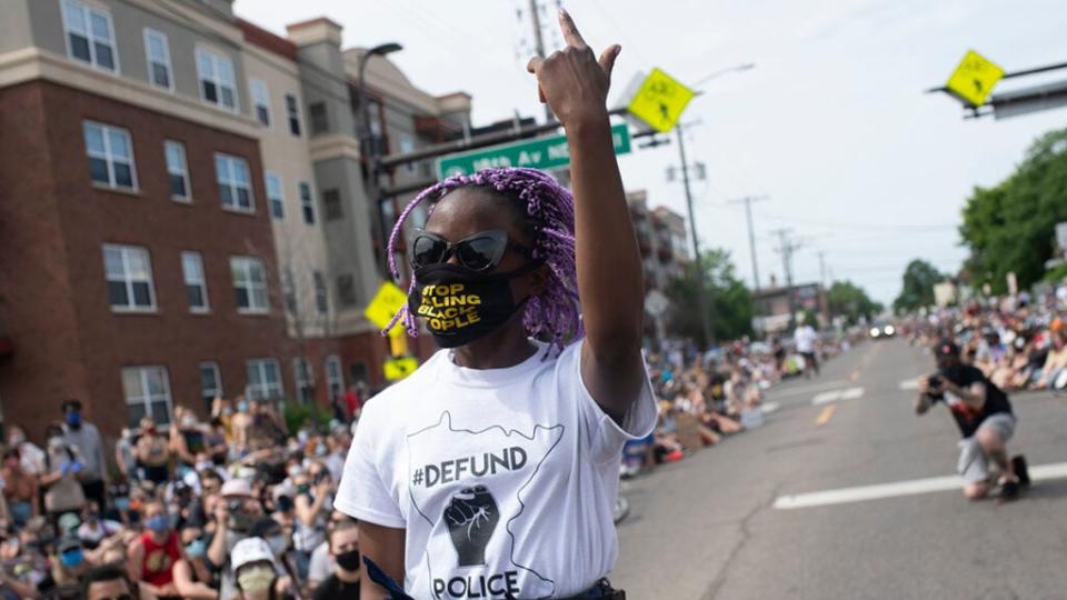 Demonstrators marching to defund the Minneapolis Police Department dance on University Avenue on June 6, 2020 in Minneapolis, Minnesota. The march, organized by the Black Visions Collective, commemorated the life of George Floyd who was killed by members of the MPD on May 25. (Photo by Stephen Maturen/Getty Images)