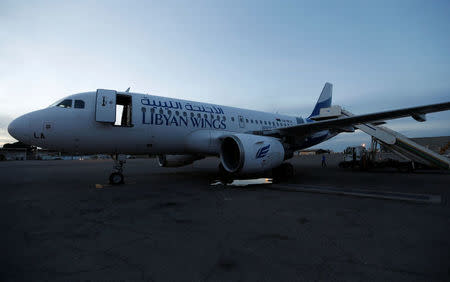 A plane, that was damaged during clashes, is seen at Mitiga airport in Tripoli, Libya, January 15, 2018. REUTERS/Ismail Zitouny