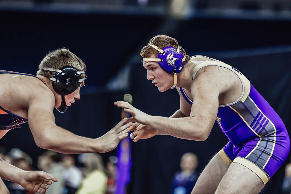 Bronson's Jacob Dixon sizes up his opponent on the way to an eight place finish at 190 pounds at the MHSAA State Finals