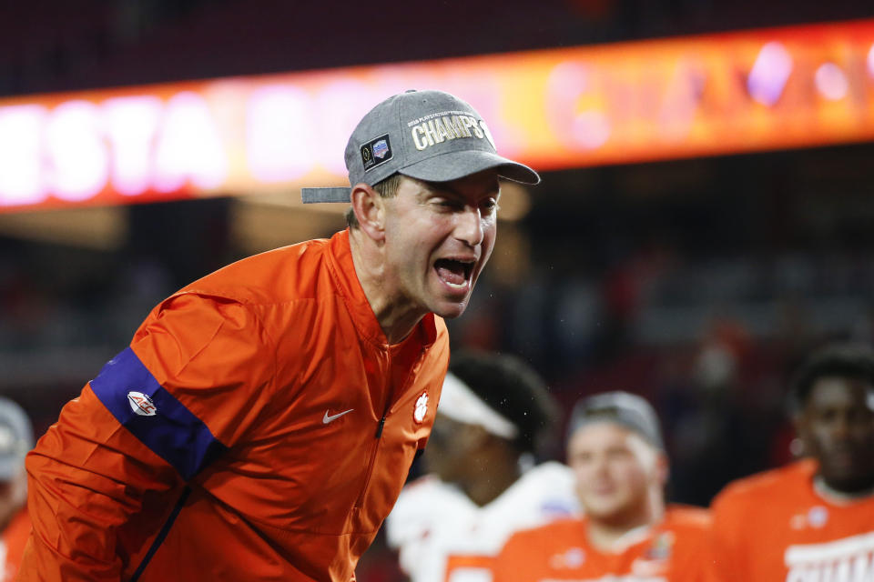 Clemson coach Dabo Swinney celebrates after Clemson defeated Ohio State 29-23 in the Fiesta Bowl NCAA college football playoff semifinal Saturday, Dec. 28, 2019, in Glendale, Ariz. (AP Photo/Ross D. Franklin)
