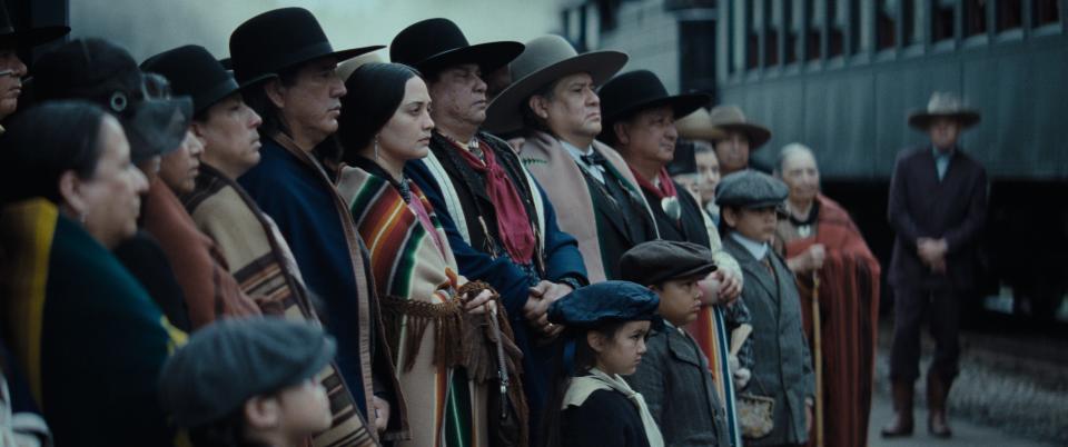 Lily Gladstone, center, stars as a member of the Osage Nation, a target for theft and murder in 1920s Oklahoma, in Martin Scorsese's "Killers of the Flower Moon."